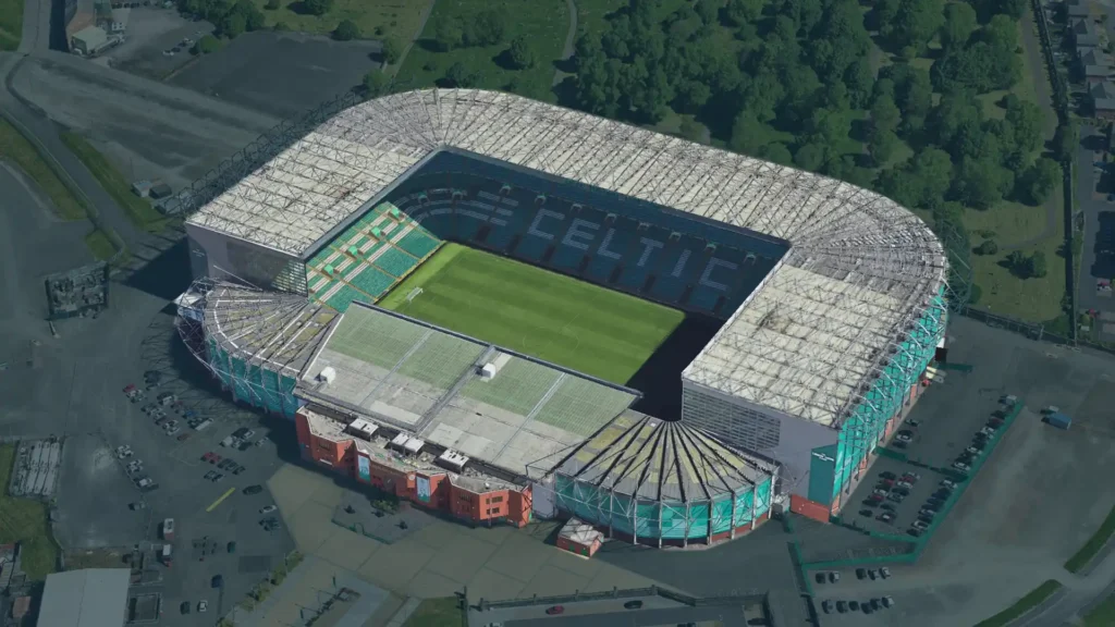 Aerial shot of Celtic Park, Glasgow — one of the most atmospheric stadiums in Europe, seen from above with its distinct green roof (Google Earth)
