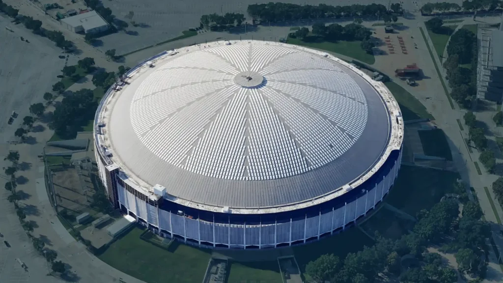 Aerial view of the Houston Astrodome, the world’s first domed stadium, standing beside NRG Stadium in a vast complex (Google Earth)